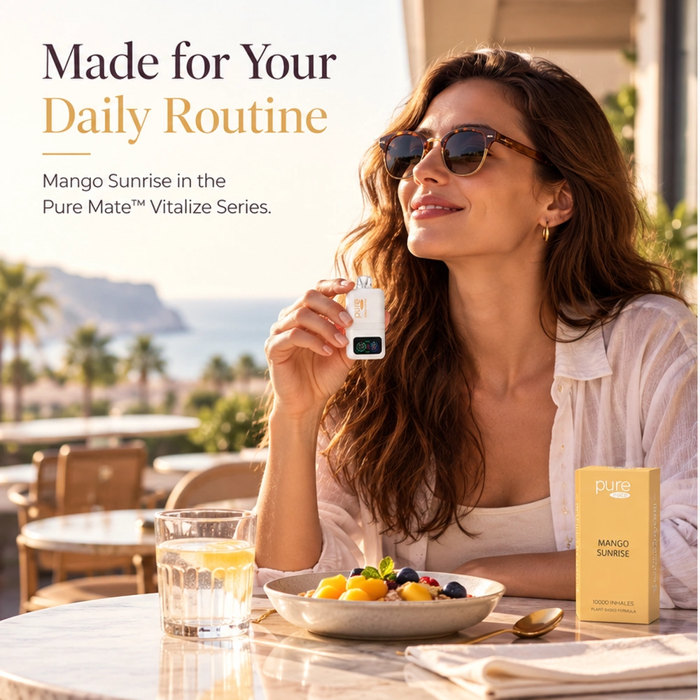 Adult woman holding Pure Mate Mango Sunrise vitamin B12 diffuser in a lifestyle setting